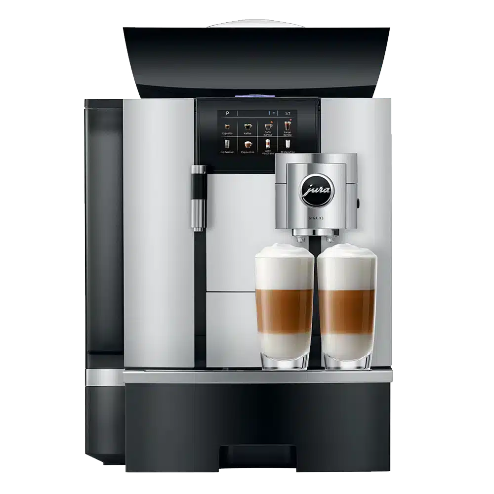 Un JURA GIGA X3c Aluminium (SB) élégant et moderne avec un affichage numérique et deux boissons au café garnies de mousse de lait fumante sur le plateau avant. La machine a un design en acier inoxydable et noir avec le logo de la marque visible sur le mousseur à lait.